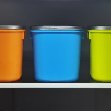 three plastic containers